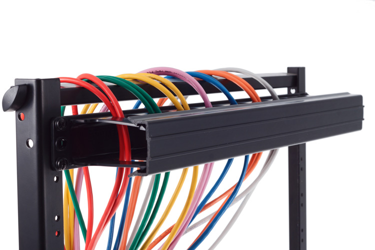 A display of cable management panels and accessories in a professional setup